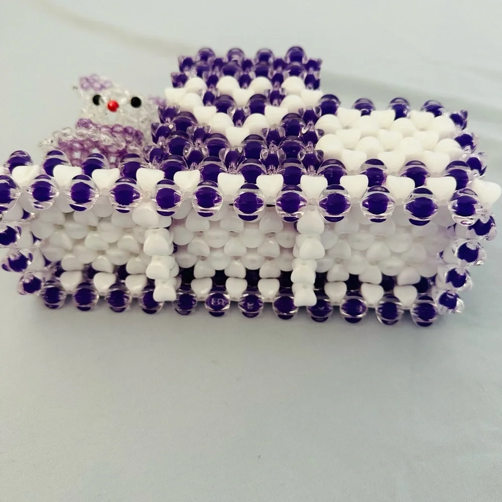 A cute little bunny pencil holder handmade beads in shades